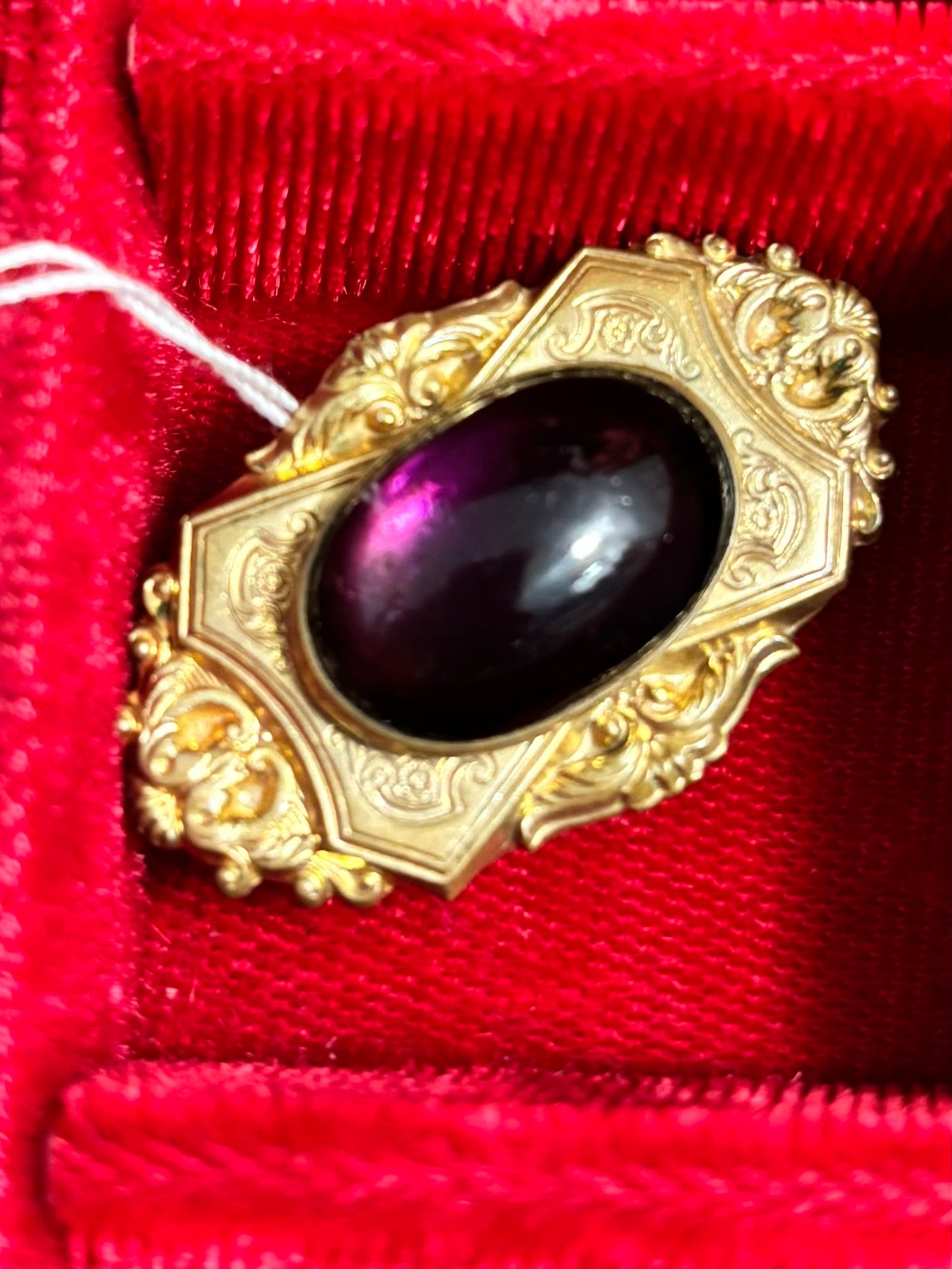 Ornate Gold filled brooch with purple glass